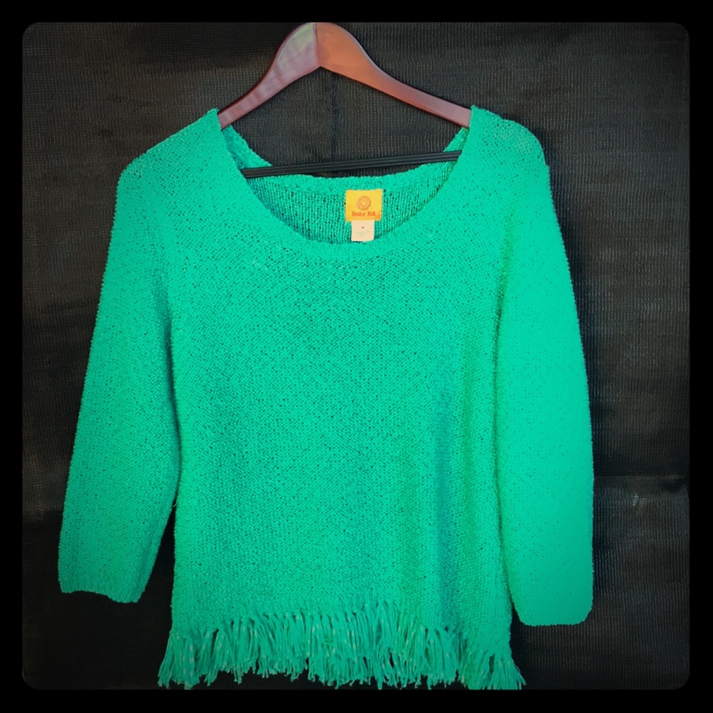 Green sweater with fringe